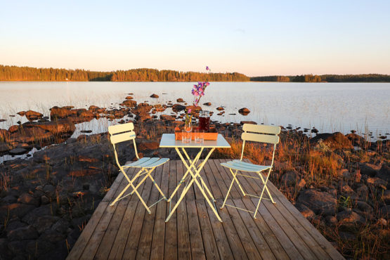 The photo shows a sunny autumn view from Villa Cone Beach fire place over the Lake Korpijarvi. No one is at sight.