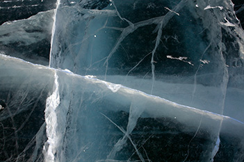 Photo shows lake ice cracking, singing and banging in a freezing night.