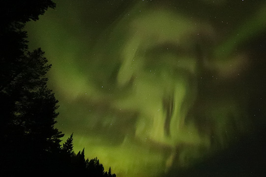 Photo shows the Northern Lights, also known as Aurora Borealis, over Villa Cone Beach.